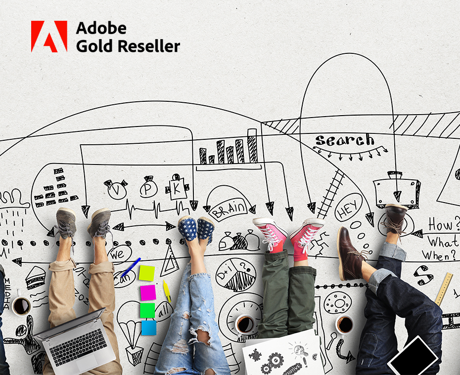 Vier Menschen (evtl. Schüler oder Studenten), die am Boden sitzen in einer kreativen Umgebung, Zeichnungen auf dem Boden, bunte Kleidung, Schuhe; einer hat einen Laptop auf dem Schoß, einer ein Tablet, gezeigt aus der Vogelperspektive, nur die Beine sind zu sehen.